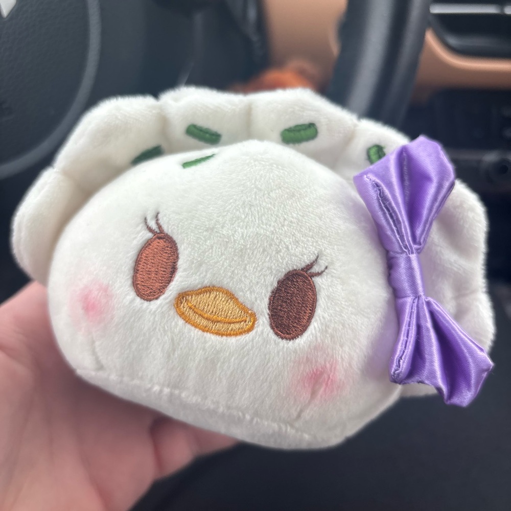Plush Dumpling Toy with Purple Bow